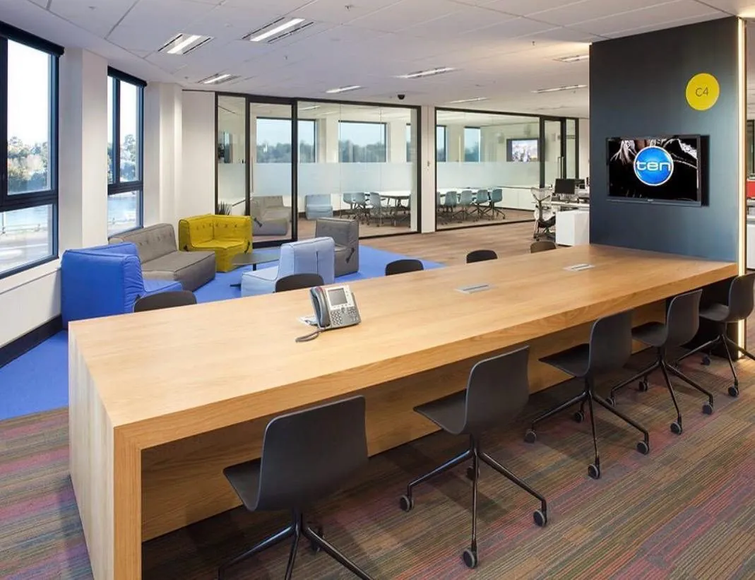Collaboration table and lounge seating at Channel 10